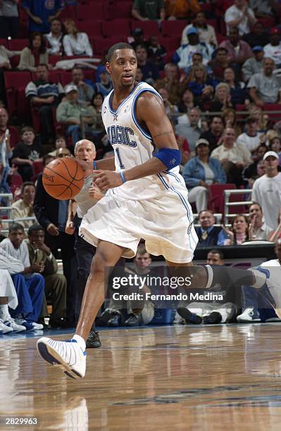 Tracy McGrady of the Orlando Magic with the ball as during the game against the New Orleans Hornets at the TD Waterhouse Centre in Orlando, Florida...