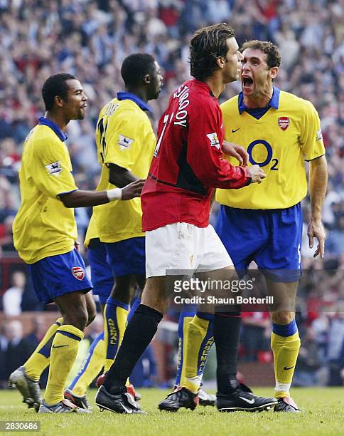 Martin Keown of Arsenal shows his feelings at Ruud Van Nistelrooy of Man Utd after he misses his penalty during the FA Barclaycard Premiership match...