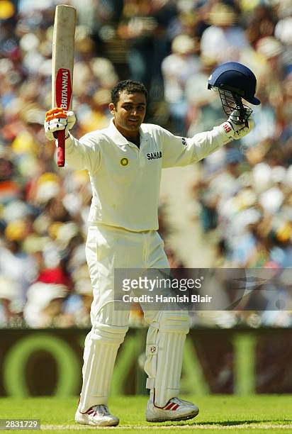 Virender Sehwag of India reaches 100 during day one of the Boxing Day 3rd Test between Australia and India at the MCG on December 26, 2003 in...
