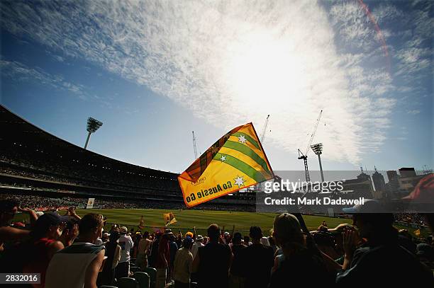Cricket fans look on during day one of the Boxing Day 3rd Test between Australia and India at the MCG on December 26, 2003 in Melbourne, Australia.