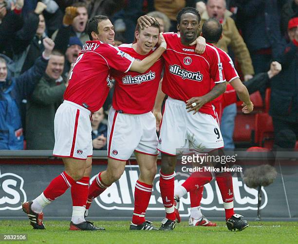 Matt Holland of Charlton Athletic is congratultaed by his team mates after he scores their second goal during the FA Barclaycard Premiership match...