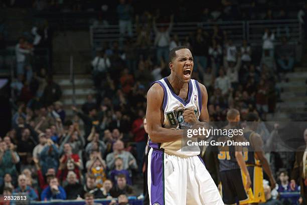 Michael Redd of the Milwaukee Bucks celebrates after sinking a three-pointer against the Indiana Pacers December 26, 2003 at the Bradley Center in...