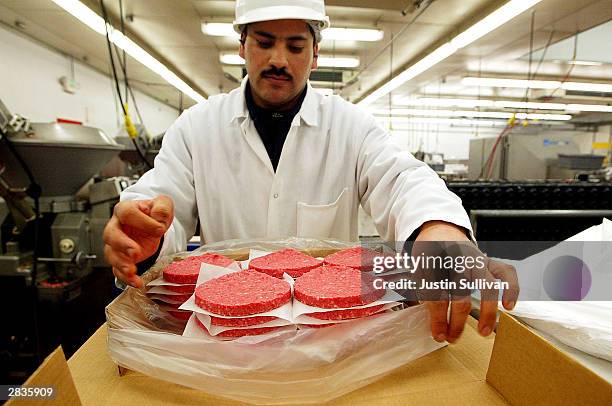 Eliseo Araujo packages ground beef patties at Ray's Wholesale Meats December 29 in Yakima, Washington. U.S. Agriculture officials on December 28...