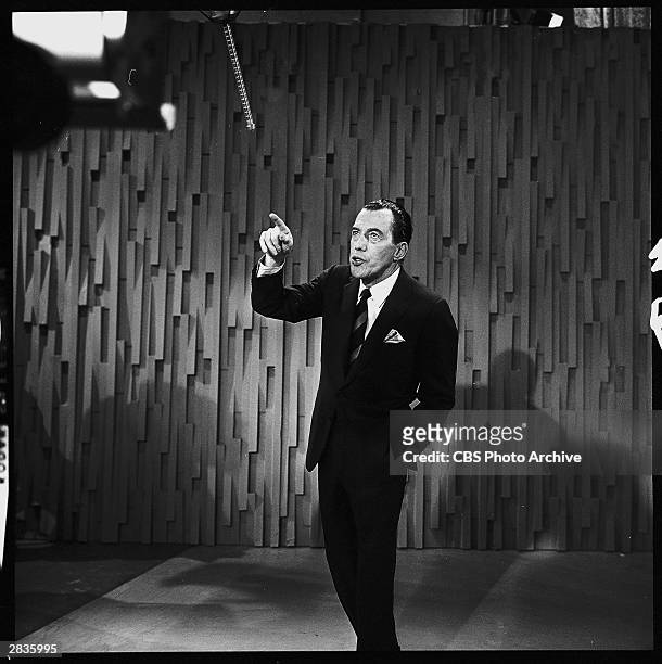 American television personality Ed Sullivan hosts 'The Ed Sullivan Show' at CBS's Studio 50, New York, New York, February 9, 1964. The episode...