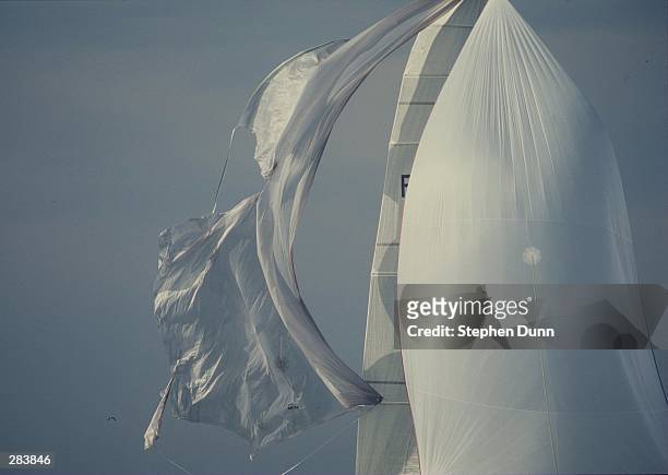 THE TORN SPINAKER OF FRANCE 2 BILLOWS IN THE WIND BEHIND A SECOND SPINAKER RAISED AFTER THE PROBLEM WITH THE FIRST DURING THE OPENING RACE OF THE...