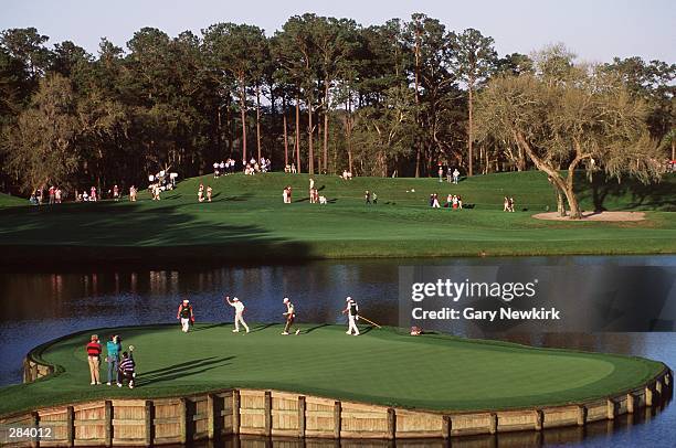 BERNHARD LANGER OF GERMANY ACKNOWLEDGES THE CROWD AFTER FINISHING THE 17TH HOLE AT TPC SAWGRASS IN PONTE VEDRA, FLORIDA.