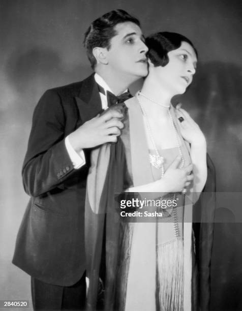 Frances Doble appears with Ivor Novello in the play 'Downhill', showing at the Queen's Theatre, 19th June 1926.