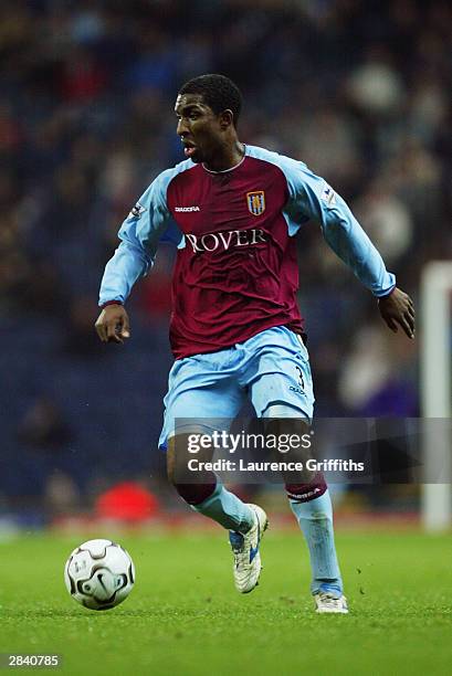 Jlloyd Samuel of Aston Villa turns with the ball during the FA Barclaycard Premiership match between Blackburn Rovers and Aston Villa on December 20,...