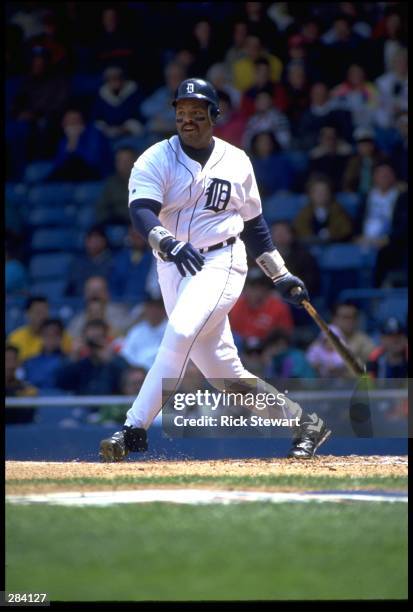 DETROIT TIGERS FIRST BASEMAN CECIL FIELDER SWINGS AT A PITCH DURING THE TIGERS VERSUS CALIFORNIA ANGELS GAME AT TIGER STADIUM IN DETROIT, MICHIGAN.