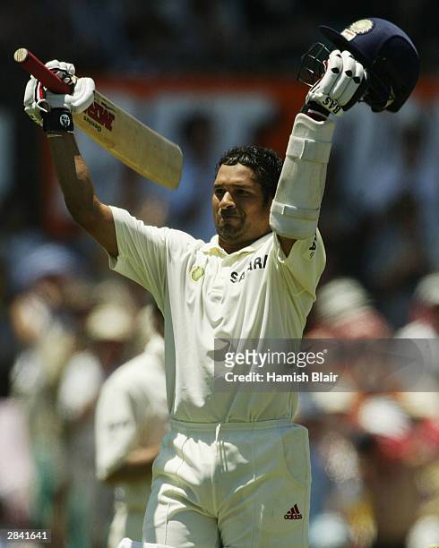 Sachin Tendulkar of India reaches his century during day two of the 4th Test between Australia and India at the SCG on January 3, 2004 in Sydney,...