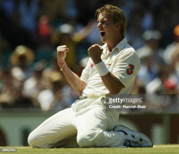 Brett Lee of Australia celebrates the wicket of Ajit Agarkar of India during day three of the 4th Test between Australia and India at the SCG on...