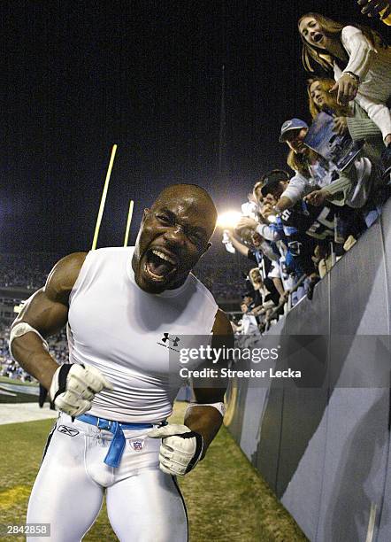 Deon Grant of the Carolina Panthers celebrates after their 29-10 defeat of the Dallas Cowboys in the NFC Wildcard playoff game on January 3, 2004 at...