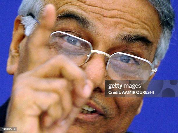 India's Foreign Minister Yashwant Sinha gestures as he addresses a press conference during the 12th South Asian Association for Regional Cooperation...