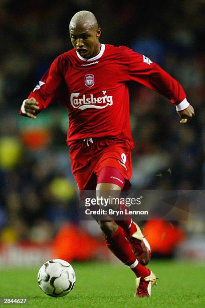 El-Hadji Diouf of Liverpool runs with the ball during the FA Barclaycard Premiership match between Liverpool and Bolton Wanderers held on December...