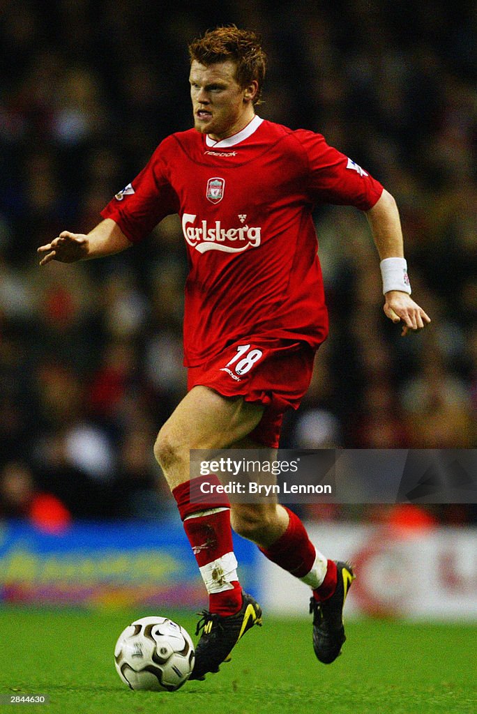 V Riise John Arne Riise of Liverpool runs with the ball during the FA... News ...