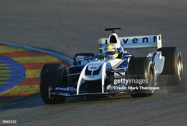 Ralf Schumacher of Germany drives the new BMW Williams FW26 for the first time, during the launch of the BMW Williams FW26 at the Ricardo Tormo...