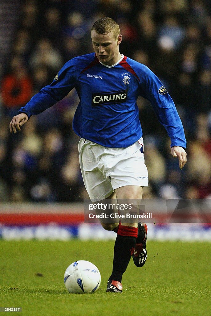 Michael Ball of Rangers running with the ball