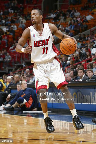 Rafer Alston of the Miami Heat moves the ball during the game against the Golden State Warriors on December 21, 2003 at American Airlines Arena in...