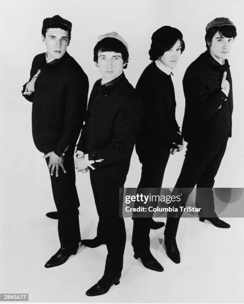 The Kinks, Mick Avory, Peter Quaife, Dave Davies, and Ray Davies, pose for a promotional photo, circa 1964.