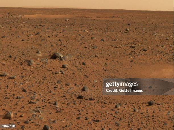 In this handout released by NASA, a portion of the first color image of Mars that was taken by the panoramic camera on the Mars Exploration Rover...