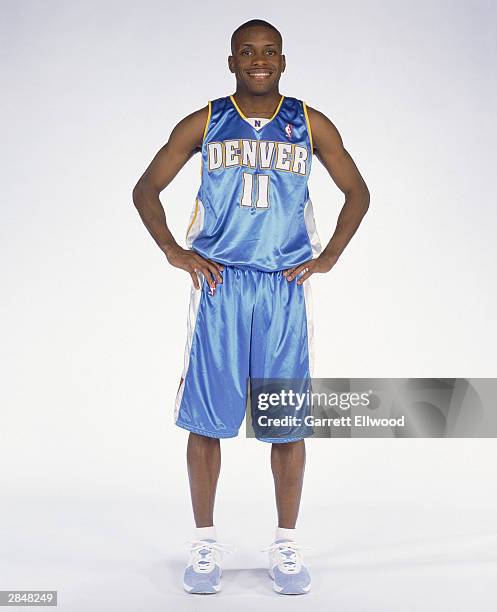 Earl Boykins of the Denver Nuggets poses for a portrait on December 20, 2003 in Denver, Colorado. NOTE TO USER: User expressly acknowledges and...