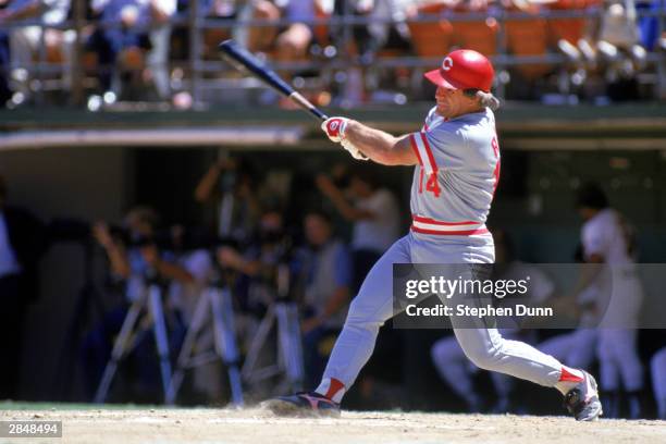 Pete Rose of the Cincinnati Reds swings at a pitch during a game against the San Diego Padres at Jack Murphy Stadium in the 1986 MLB season in San...