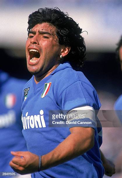 Diego Maradona of Napoli celebrates a goal during an Italian Serie A match against AC Milan at the San Paolo Stadium in Naples, Italy. Milan won the...