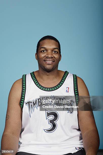 Oliver "Pig" Miller of the Minnesota Timberwolves poses for a picture before the start of the game against the Chicago Bulls on December 30, 2003 at...