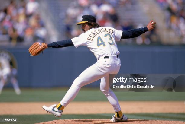 Pitcher Dennis Eckersley of the Oakland Athletics delivers against the Cleveland Indians during the game at the Oakland-Alameda County Coliseum on...