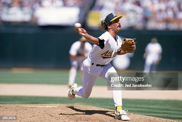 Pitcher Dennis Eckersley of the Oakland Athletics delivers against the Milwaukee Brewers during the game at the Oakland-Alameda County Coliseum on...