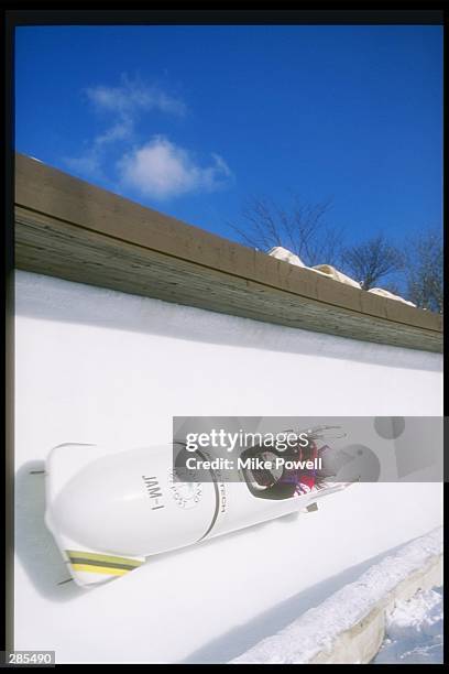 View of the Jamaica 1 bobsleigh team with driver Dudely Stokes during four man training at Spiral Nagano, Japan. Mandatory Credit: Mike Powell...