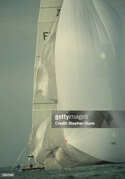 THE SPINAKER OF FRA 33, FRANCE 2, BILLOWS IN THE WIND AFTER BREAKING A SHORT DISTANCE FROM THE FINISH IN THEIR FIRST RACE OF THE LOUIS VUITTON...