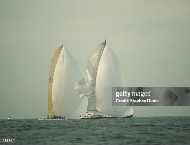 THE SPINAKER OF FRA 33, FRANCE 2, BILLOWS IN THE WIND AFTER BREAKING A SHORT DISTANCE FROM THE FINISH OF THEIR RACE WITH AUS29, SYDNEY 95, CLOSE...
