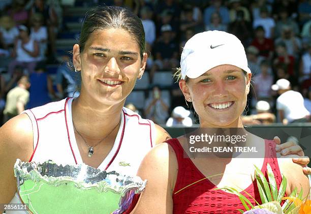 Eleni Daniilidou of Greece with the winners trophy and Ashley Harkleroad of the USA stand together after their singles final match on day 6 of the...