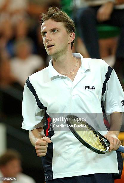 Karol Kucera of the Slovak Republic celebrates winning the second set against James Blake of USA during the Hopman Cup Final between USA and Slovak...