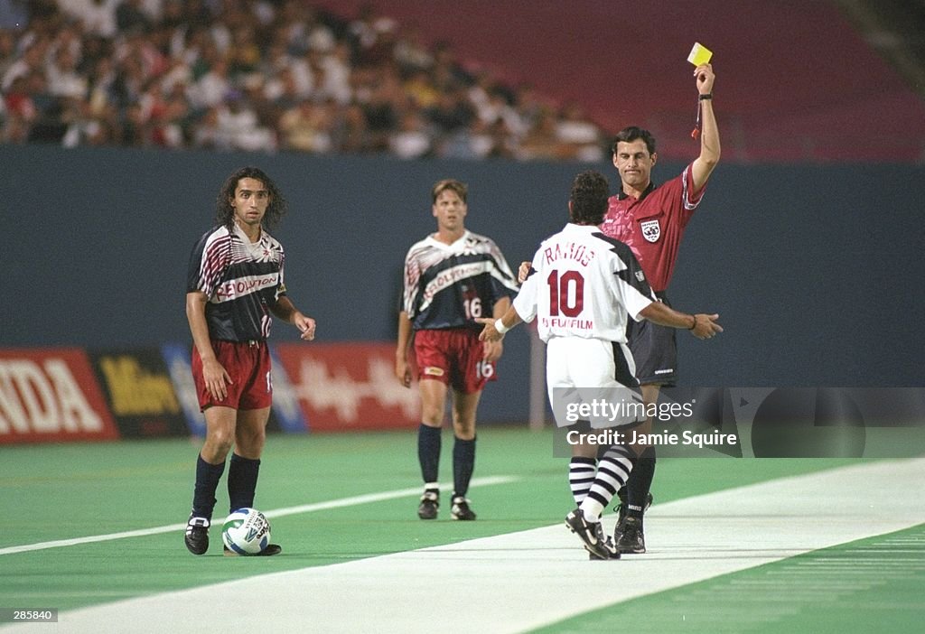 Tab Ramos of the New York/New Jersey MetroStars is given a yellow ...