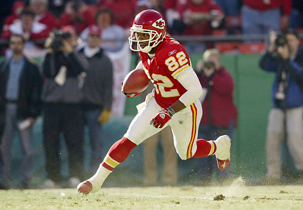 Kick returner Dante Hall of the Kansas City Chiefs returns a punt for a touchdown against the Indianapolis Colts in the AFC Divisional Playoffs on...