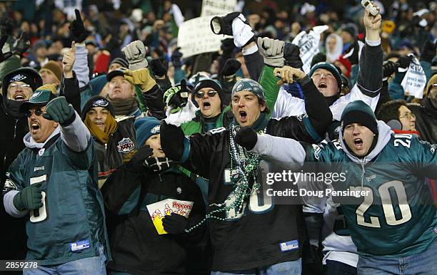 Philadelphia Eagles fans celebrate after running back Duce Staley of the Philadelphia Eagles scored on a 7-yard touchdown catch in the second quarter...