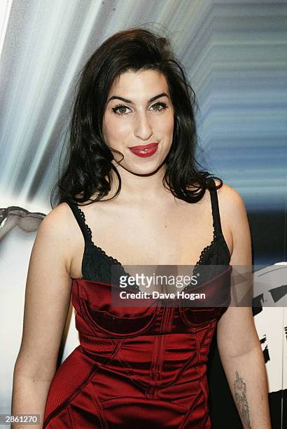 Singer Amy Winehouse arrives at the announcement of the shortlist for The Brit Awards 2004 at the Park Lane Hotel on January 12, 2004 in London. The...