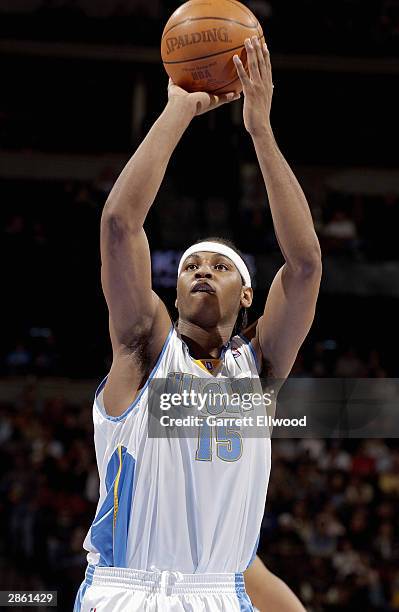 Carmelo Anthony of the Denver Nuggets shoots a free throw during the game against the Atlanta Hawks at the Pepsi Center on January 3, 2004 in Denver,...