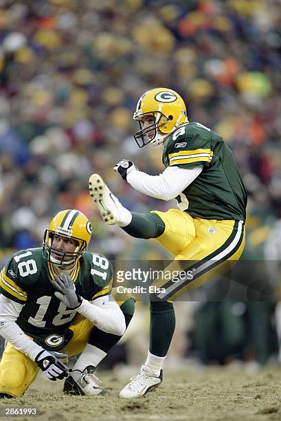 Kicker Ryan Longwell of the Green Bay Packers kicks the ball during the NFC playoff game against the Seattle Seahawks on January 4, 2004 in Lambeau...