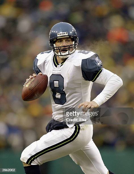 Quarterback Matt Hasselbeck of the Seattle Seahawks rolls out of the pocket during the NFC playoff game against the Green Bay Packers on January 4,...