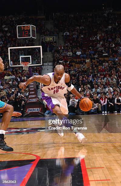 Vince Carter of the Toronto Raptors drives down the lane during the game against the New Orleans Hornets at the Air Canada Centre on January 2, 2004...