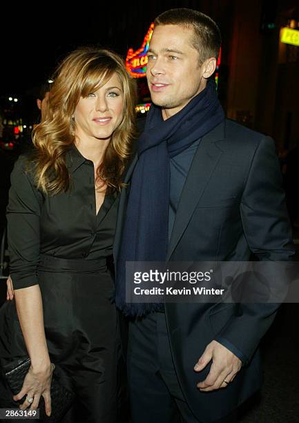 Actress Jennifer Aniston and actor Brad Pitt attend the Los Angeles premiere of Universal Pictures' film "Along Came Polly" at the Grauman's Chinese...