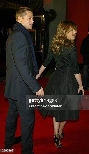 Actress Jennifer Aniston and actor Brad Pitt attend the Los Angeles premiere of Universal Pictures' film "Along Came Polly" at the Grauman's Chinese...