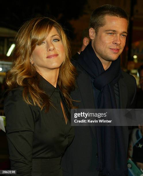 Actress Jennifer Aniston and actor Brad Pitt attend the Los Angeles premiere of Universal Pictures' film "Along Came Polly" at the Grauman's Chinese...