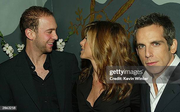 Director John Hamburg, actress Jennifer Aniston and Ben Stiller attend the Los Angeles premiere of Universal Pictures' film "Along Came Polly" at the...