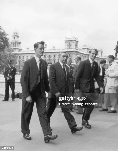 Labour M.P's Tam Dalyell , George Brown and Dr Jeremy Bray arrive at the House of Commons, London, 26th June 1962. Both Dalyell and Bray are newly...