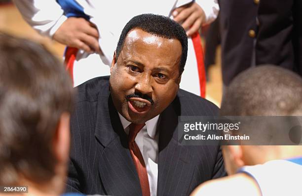 Assistant coach Mike Woodson of the Detroit Pistons in the huddle during the game against the Golden State Warriors at The Palace of Auburn Hills on...