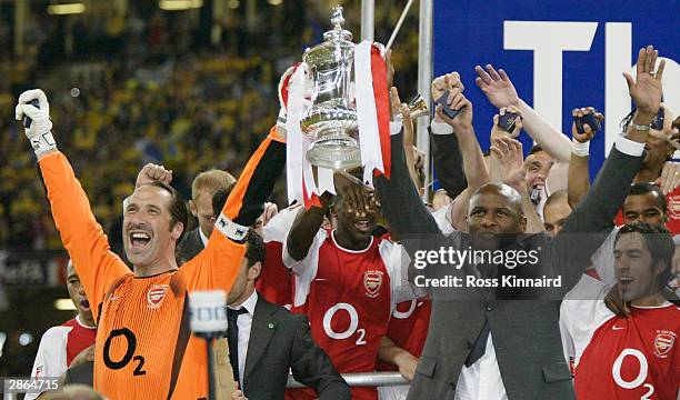 David Seaman and Patrick Vieira of Arsenal lift the FA Cup after a 1-0 victory over Southampton during the FA Cup Final between Arsenal and...